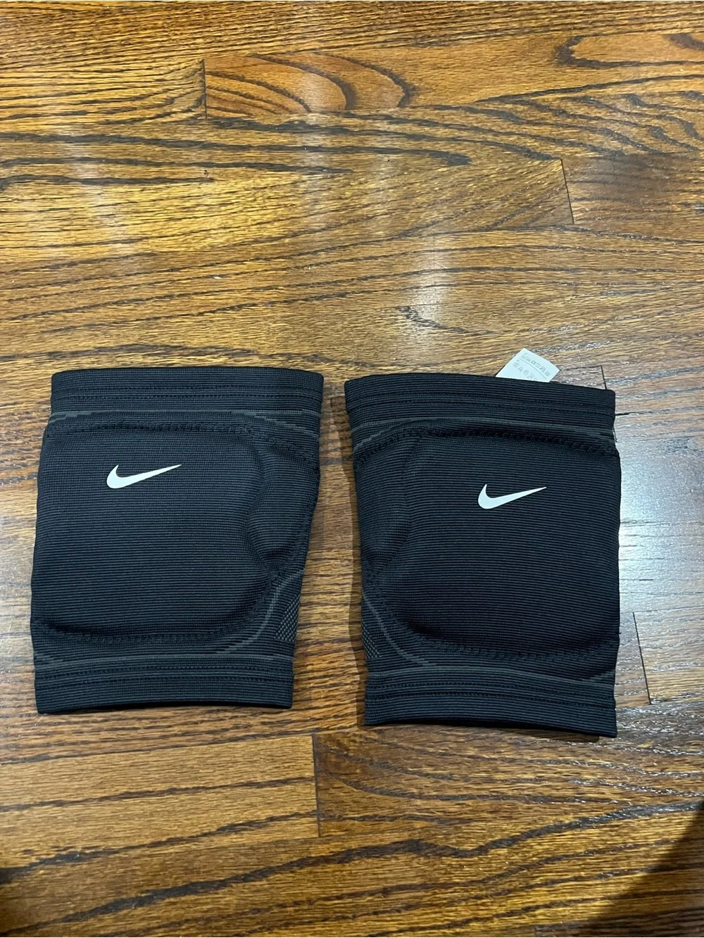 Nike Varsity Volleyball Knee Pad featuring a prominent white Nike Swoosh